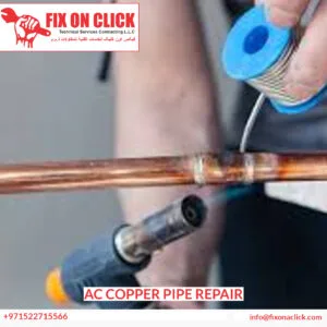 AC Copper Pipe Repair Dubai - Fix On Click technician fixing a refrigerant line