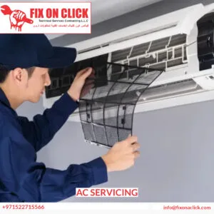 Technician performing comprehensive AC servicing in Dubai