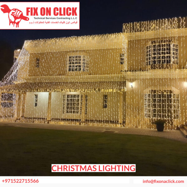 Fix On Click technician installing professional Christmas lighting on Dubai property