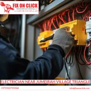 Licensed electrician troubleshooting a circuit breaker panel in a Jumeirah Village Triangle villa