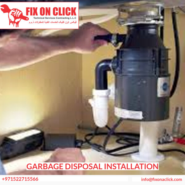 Fix On Click technician completing garbage disposal installation under kitchen sink Dubai