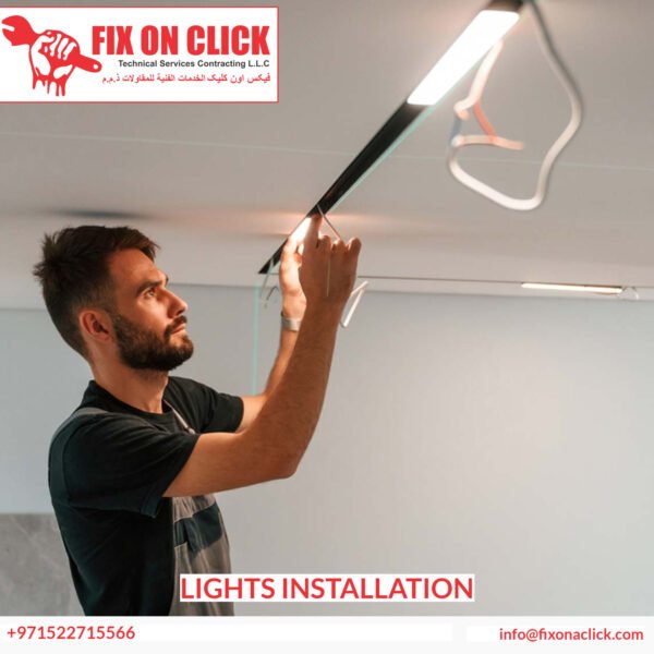 Fix On Click electrician installing LED downlights in Dubai apartment ceiling