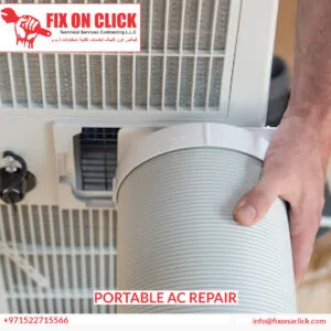 HVAC technician inspecting portable AC unit mechanics in Dubai
