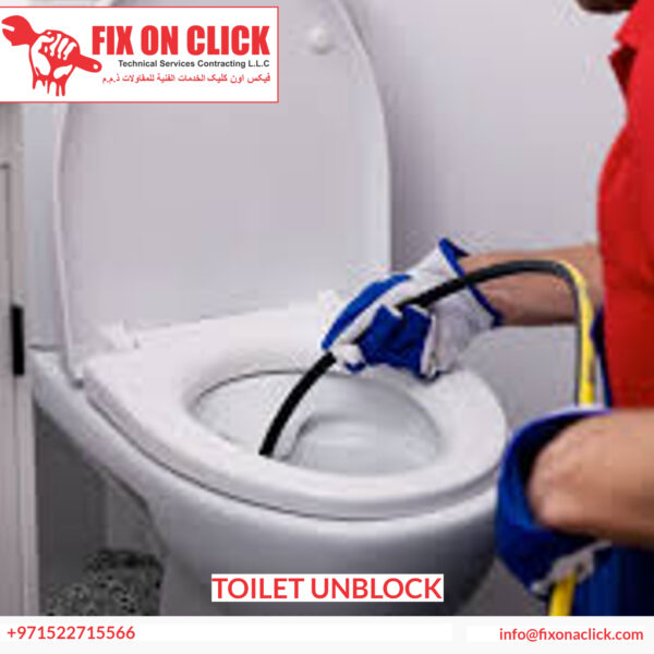Fix On Click plumber using professional drain clearing equipment on blocked toilet Dubai