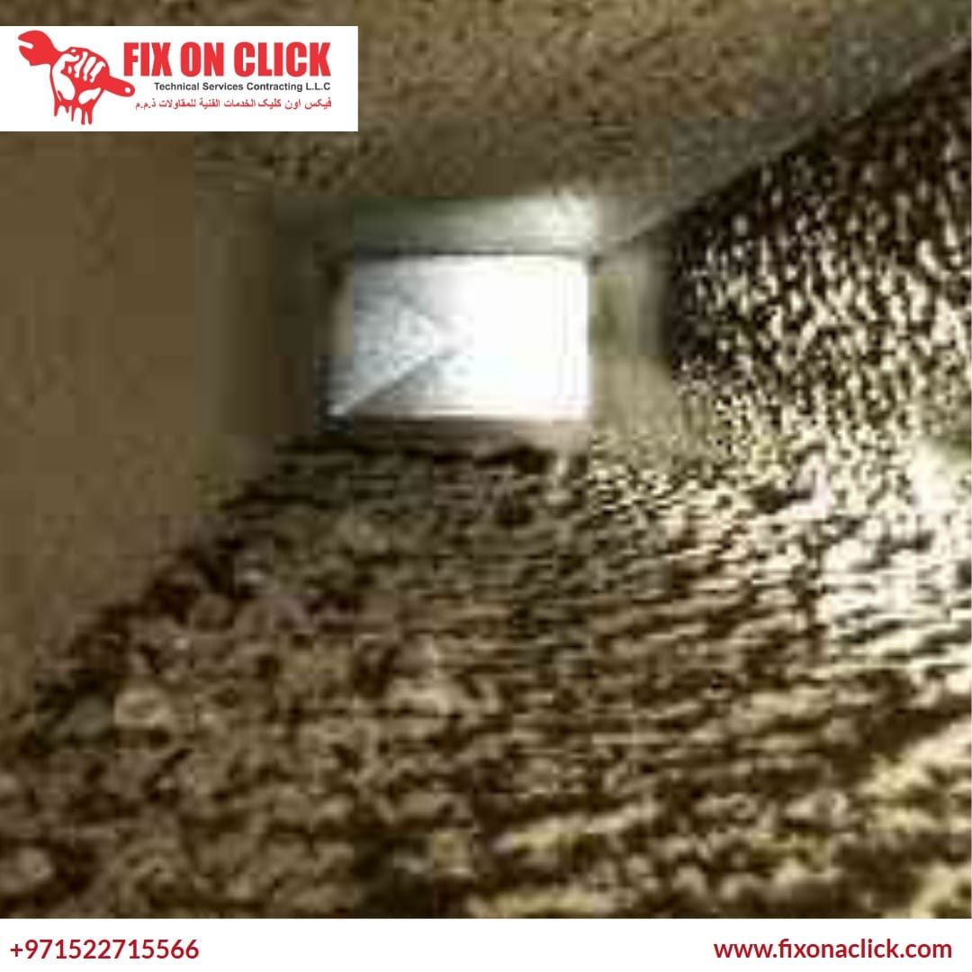AC duct cleaning service Dubai - Fix On Click HVAC technician at work