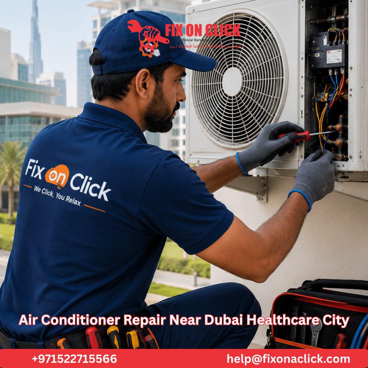Technician checking condensate drain line on split AC unit in Dubai Healthcare City apartment
