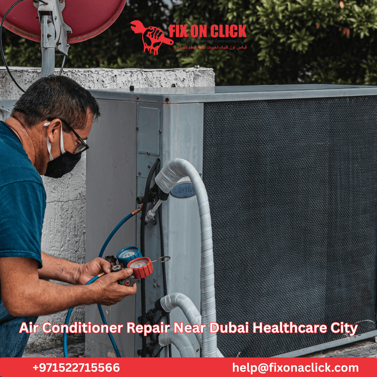 AC repair technician working on outdoor unit near Dubai Healthcare City clinic building in summer
