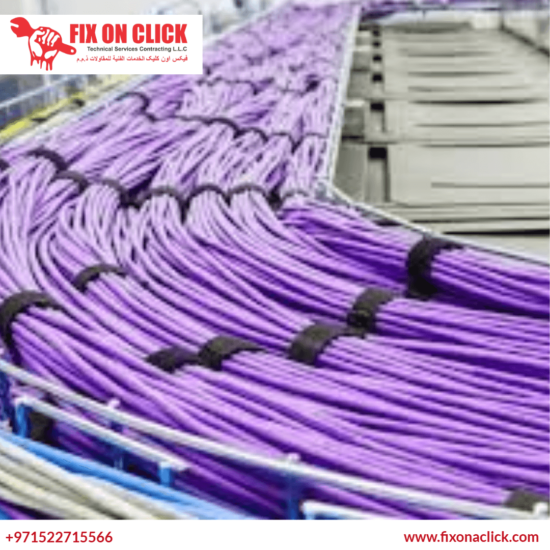 Organised cable tray and labelled data runs - Fix On Click cable management Dubai