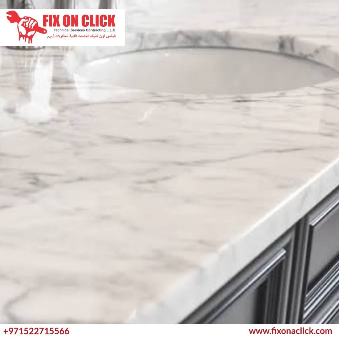 Expert installing a custom cut marble vanity top