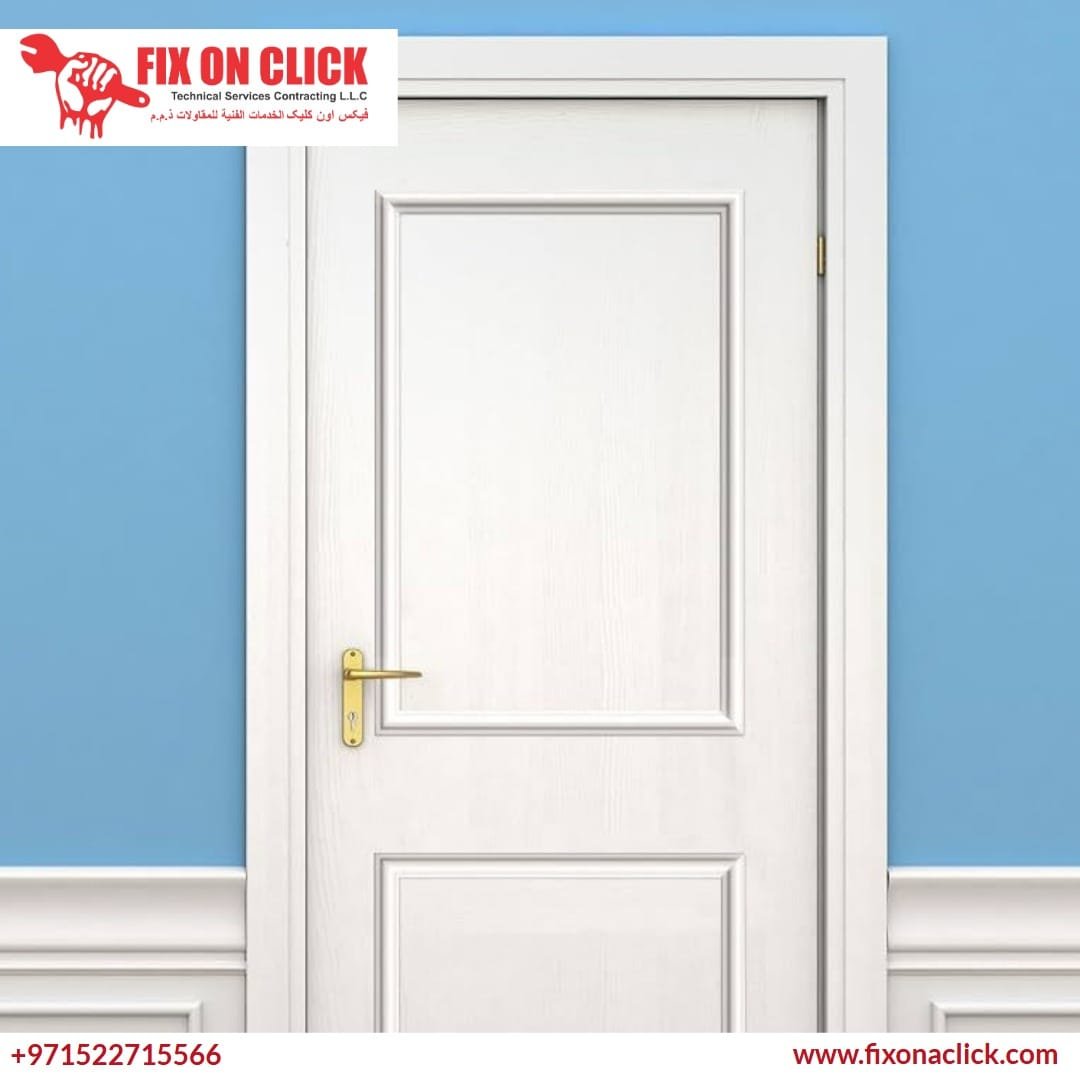 Fix On Click carpenter using a power planer to trim a wooden door