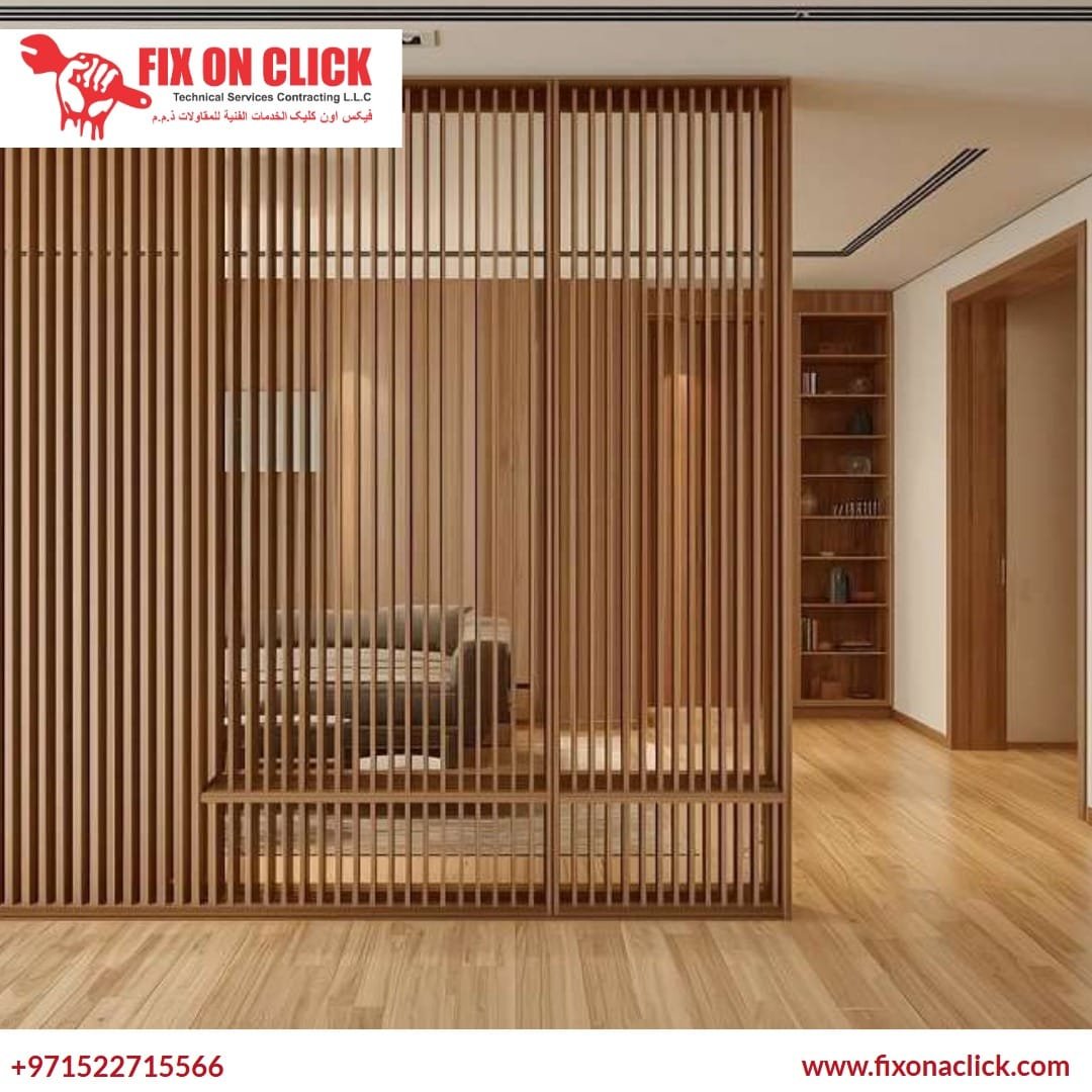 Carpenter securing wooden slats for a partition