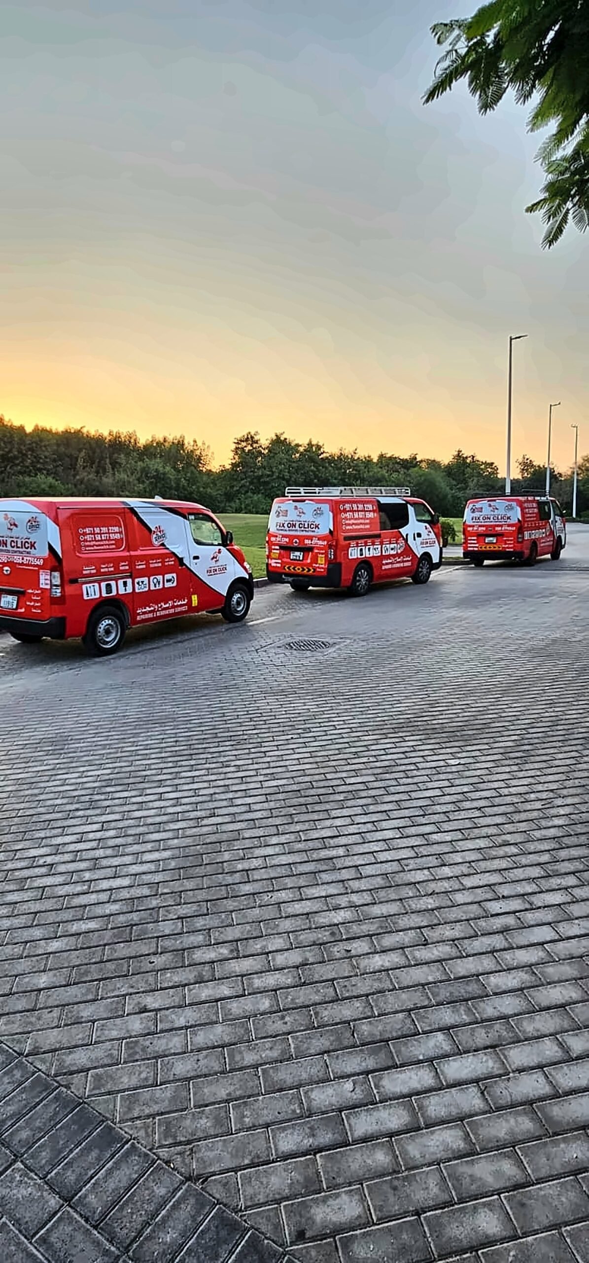 Fix On Click vans lined up at sunset ready for evening call-outs