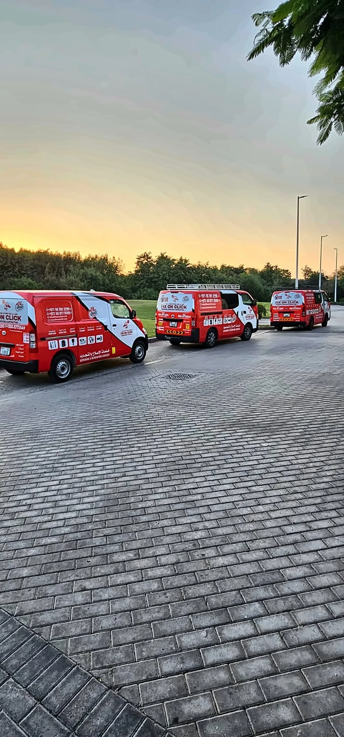 Fix On Click vans lined up at sunset ready for evening call-outs